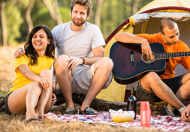 istock Friends storytelling at camping 507236735