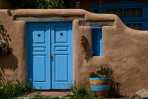 Santa Fe, NM: Sunlit Old Blue Door in Orange Adobe Wall
