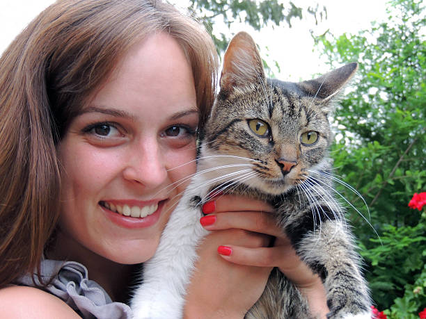istock Beautiful girl with colorful cat 507239833
