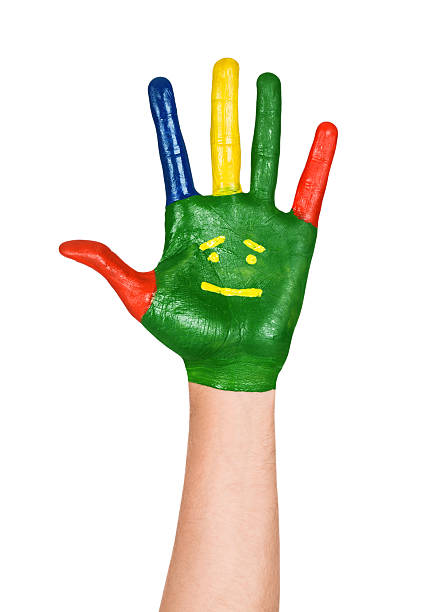 istock open hand painted green with smiles on isolated white background 507240937