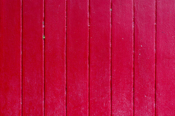 istock painted old wooden wall. red background 507243187