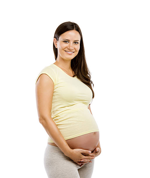 istock Pregnant woman isolated on white 507243941