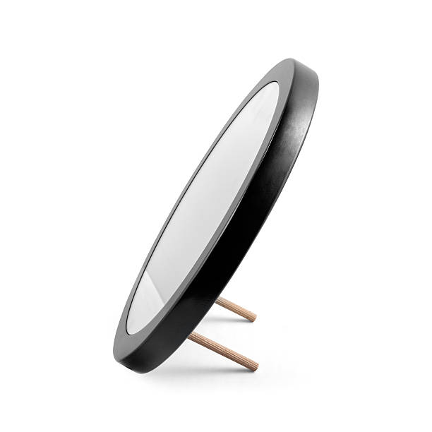 istock Rounded mirror in black wooden frame - isolated on white 507246774