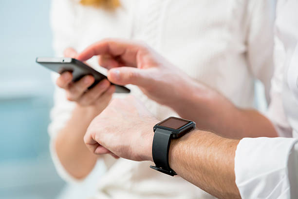 Close up of man hands with smart watch