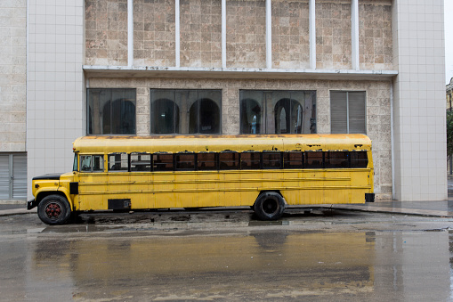 old historical american school bus at street of havana cuba