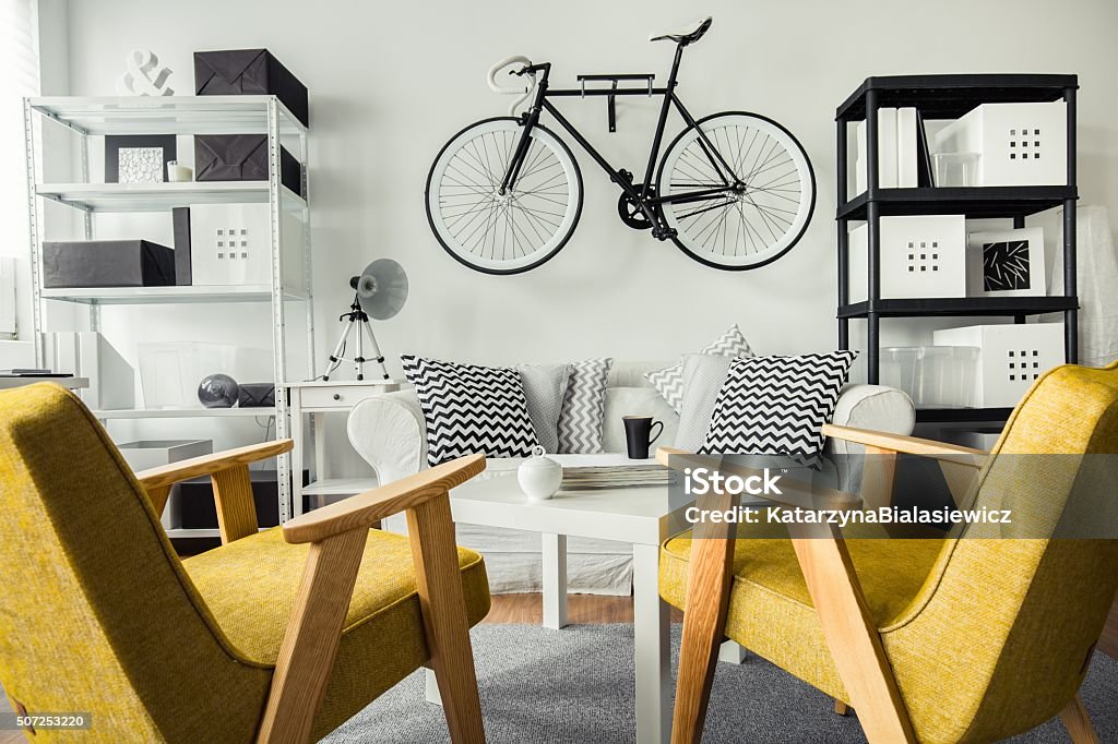 Retro yellow chairs Black and white room and retro yellow chairs Bicycle Stock Photo