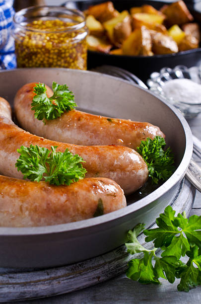 istock Grilled sausages with potatoes 507253548