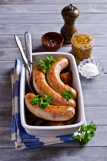 istock Grilled sausages with potatoes 507254206
