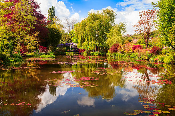 Small pond with lilies, Giverny, France Small pond with lilies in Giverny, Normandy, France giverny stock pictures, royalty-free photos & images