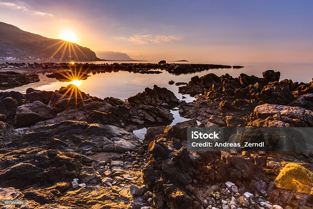 Captivating Coastal Sunset Captivating Coastal Sunset near Palermo on the island of Sicily, Italy. Lovely subtropical winter landscape at the sea. Enchanted Atmosphere in the evening Atmosphere Stock Photo