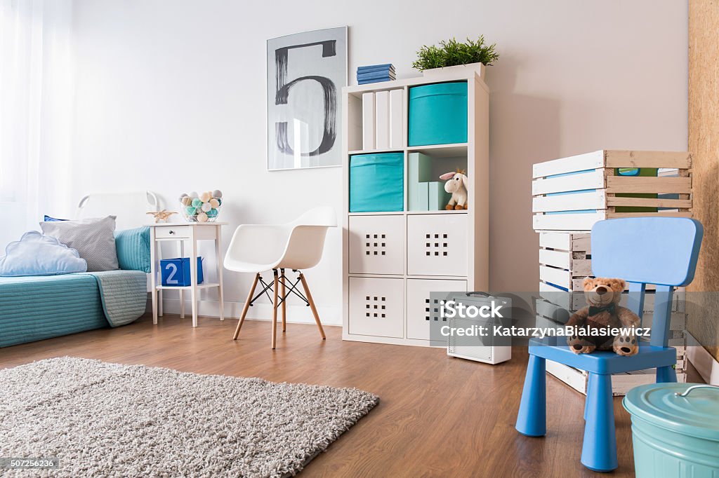 Space for sleep and play Spacious interior for child with flooring, carpet and new furniture Child Stock Photo