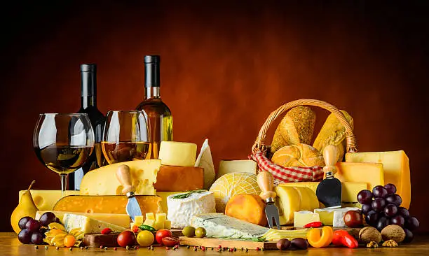 Combination of cheese and wine in still life