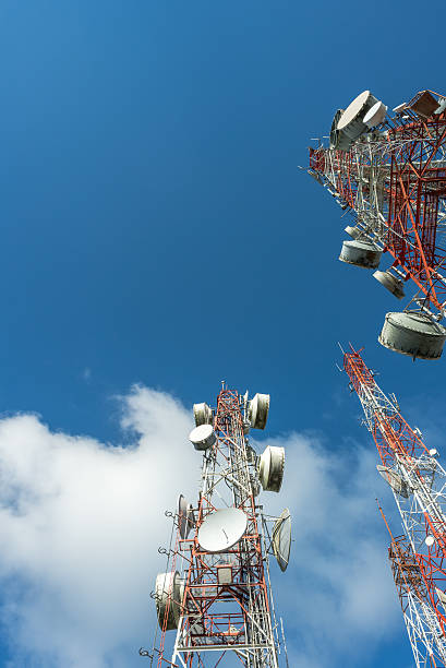 istock Three big radio mast with blue sky 507261112