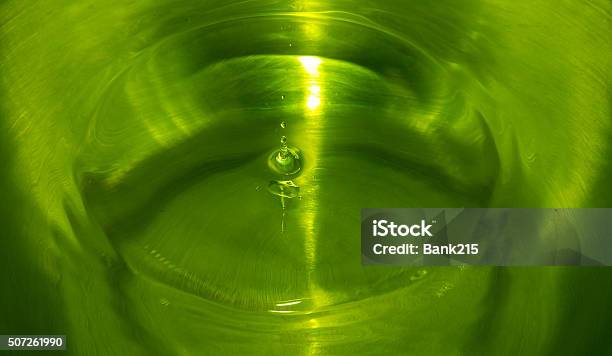 Water Drop On Green Filter Stock Photo - Download Image Now - Abstract, Backgrounds, Blue