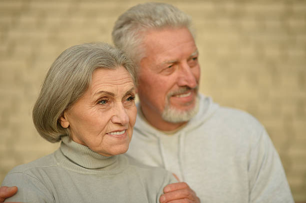 istock Mature couple near wall 507262644