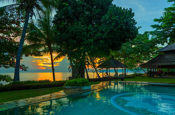 istock sunrise over ocean with blue pool in Bali Indonesia 507263944