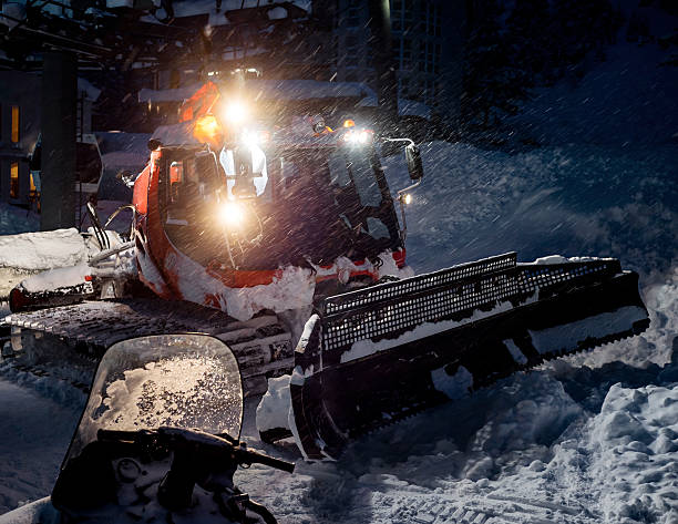 istock Snowcat preparing a slope in mountains 507264070