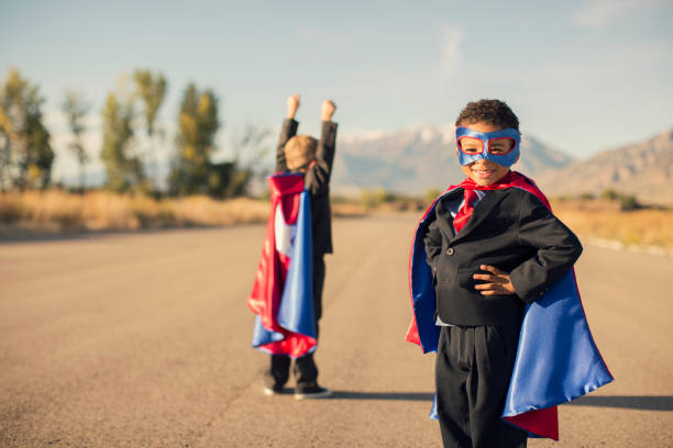 istock Two Business Boys Dressed in Superhero Costumes 507264132