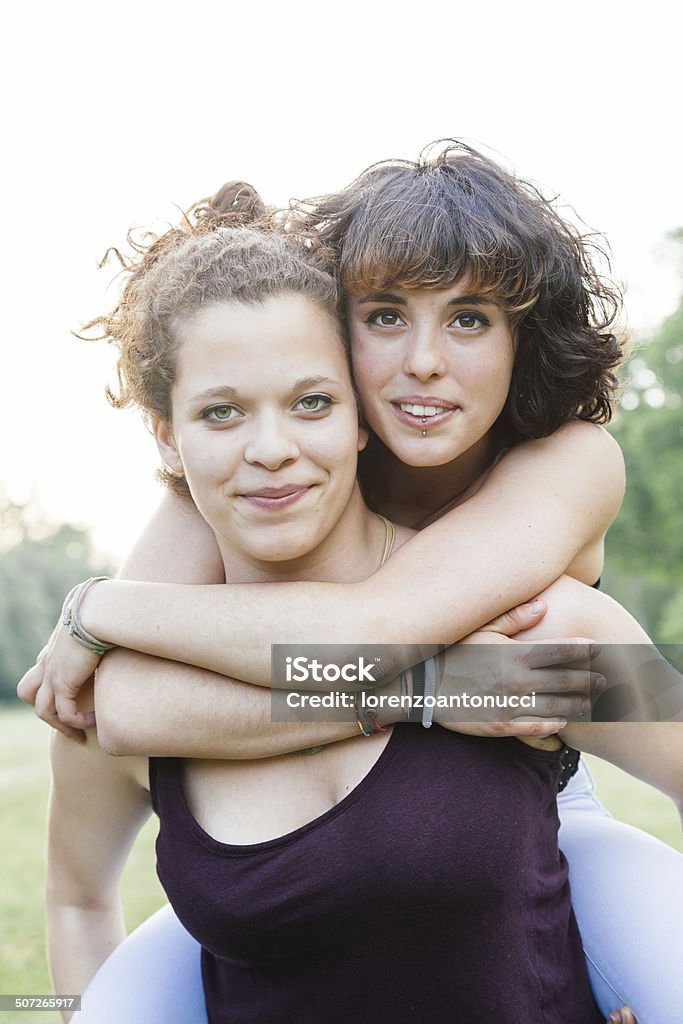 Park in summer. Young couple Young couple of girls at the park on a summer day 14-15 Years Stock Photo