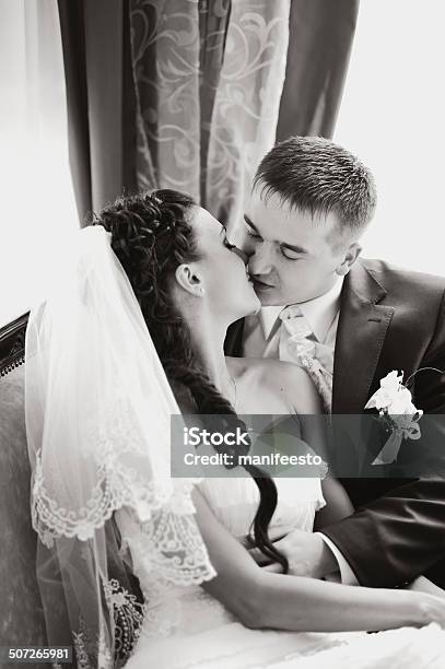 Couple Kissing In Restaurant Stock Photo - Download Image Now - Adult, Adults Only, Beautiful People