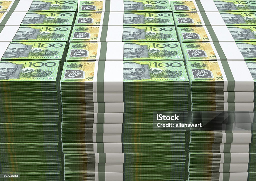 Australian Dollar Notes Pile A pile of wads of australian dollar banknotes on an isolated background Australia Stock Photo