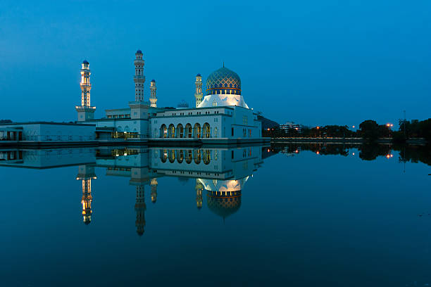 istock Reflection of Kota Kinabalu city mosque at blue hour 507267199