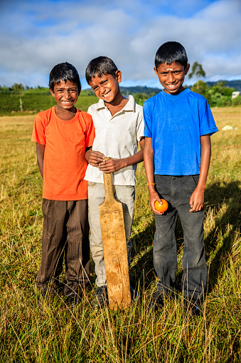Young Sri Lankan boys playing cricket near Nuwara Elliya, Sri Lanka. Sri Lanka (Ceylon) is the world's fourth largest producer of tea and the industry is one of the country's main sources of foreign exchange and a significant source of income for laborers.http://bem.2be.pl/IS/rajasthan_380.jpg