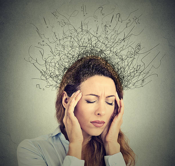 istock sad woman stressed face expression brain melting into lines 507270596