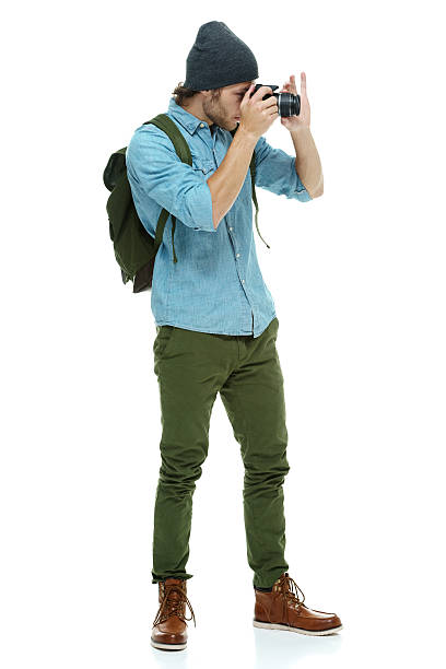 istock Photographer in action with slr camera 507271187