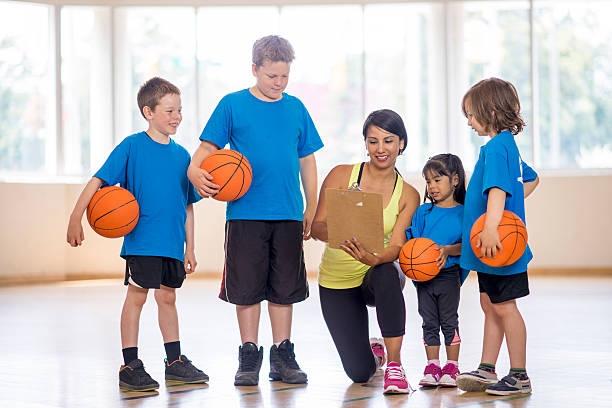 istock Basketball Coach Showing the Kids a Play 507272332
