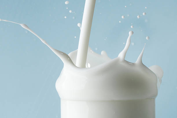 istock Splash of milk in glass 507272342