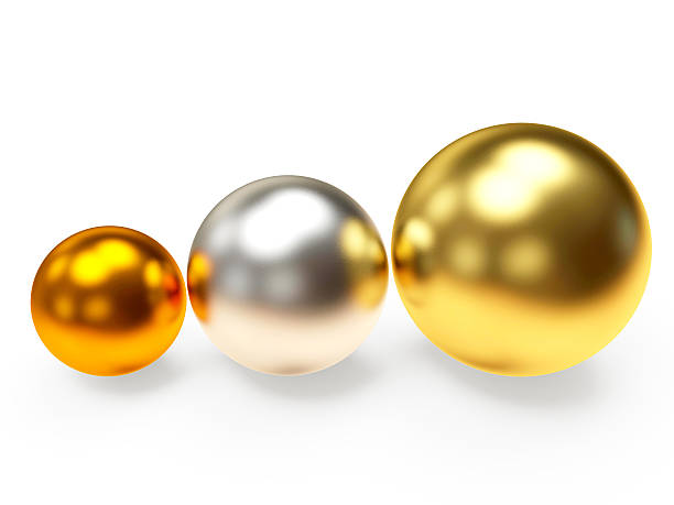 istock Three shining golden,silver and bronze spheres 507272464