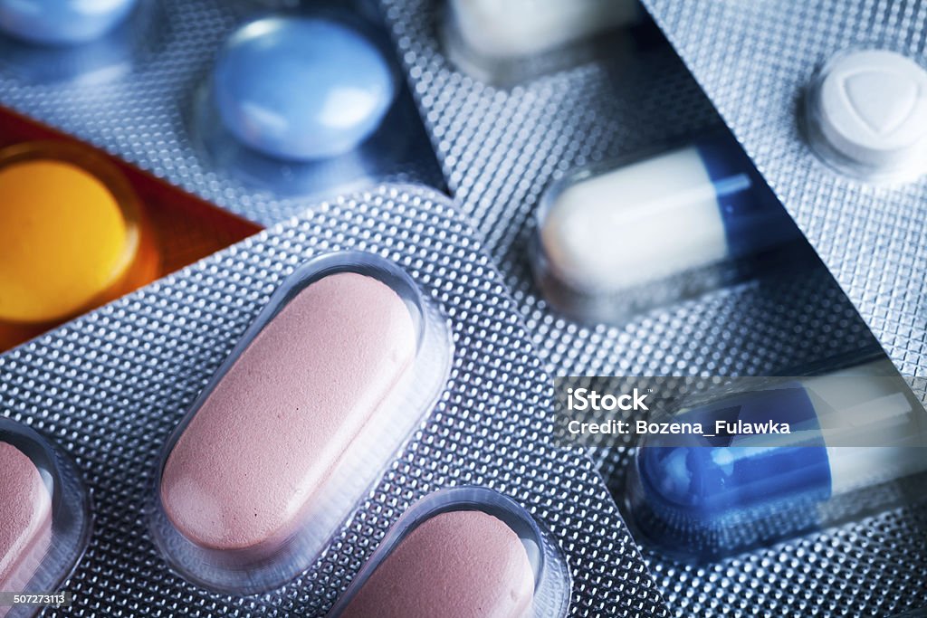 Pills Pills in blister pack closeup for background Backgrounds Stock Photo