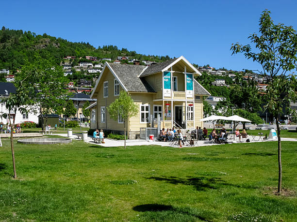 Sogndal, Norway - June 23, 2010: People on outdoor terrace of cafe in Sogndal, Sognefjord, Norway