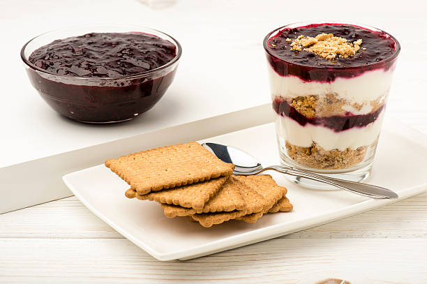 istock Healthy dessert with natural yogurt,biscuits and black currant jam. 507274934