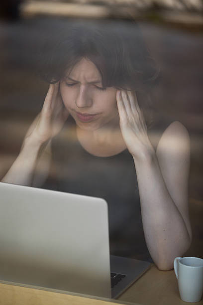 istock Young woman having headache 507275168