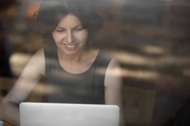 istock Young woman working on laptop 507275682