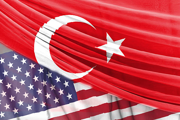 turquía y estados unidos bandera en fondo de cortina - turquia bandera fotografías e imágenes de stock