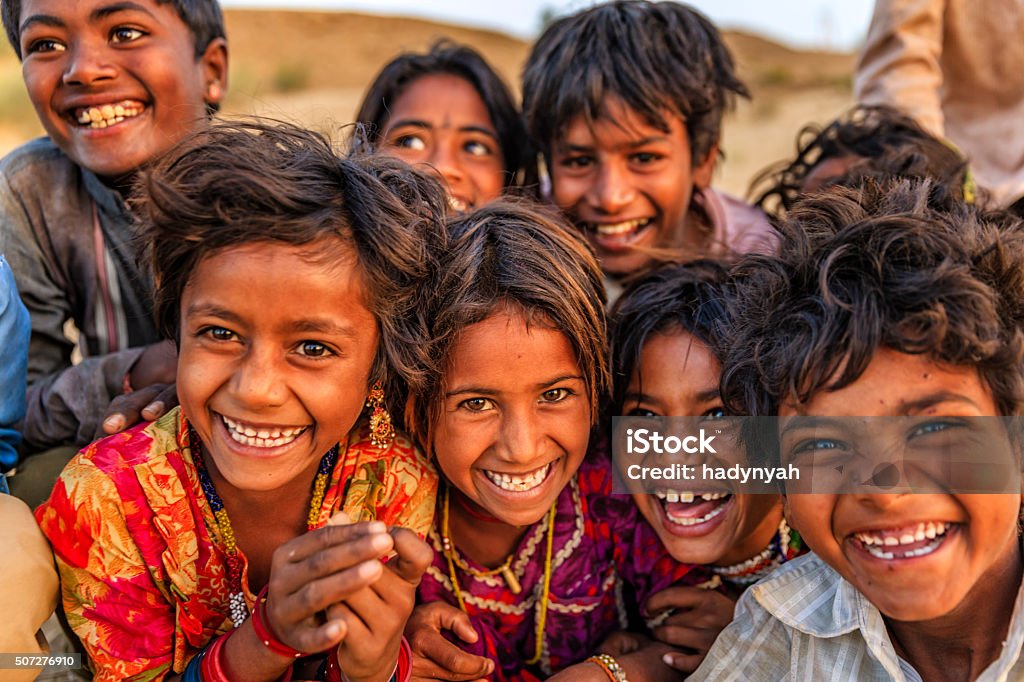 Group of happy Gypsy Indian children, desert village, India Group of happy Gypsy Indian children - desert village, Thar Desert, Rajasthan, India. India Stock Photo