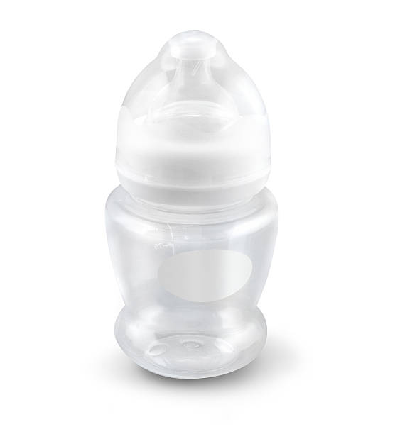 istock Transparent baby nipple bottle isolated on white 507278364