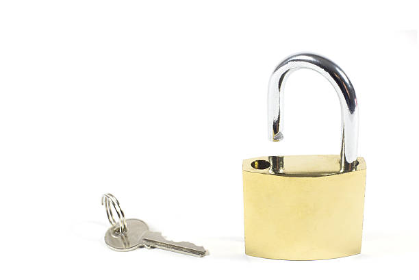istock Open Padlock And Key Isolated On White Background, Closeup 507278836