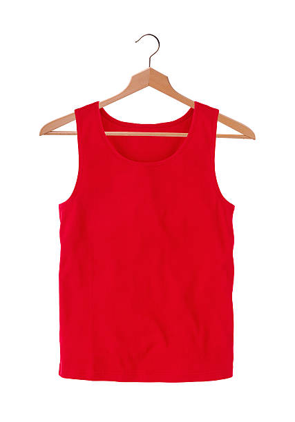 istock Red t-shirts on hangers isolated on white background 507278866
