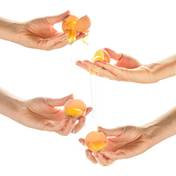 istock collage with four women hands crack eggs. 507280066