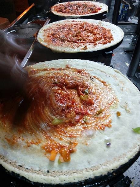 indian street food dosa shot with mobile phone