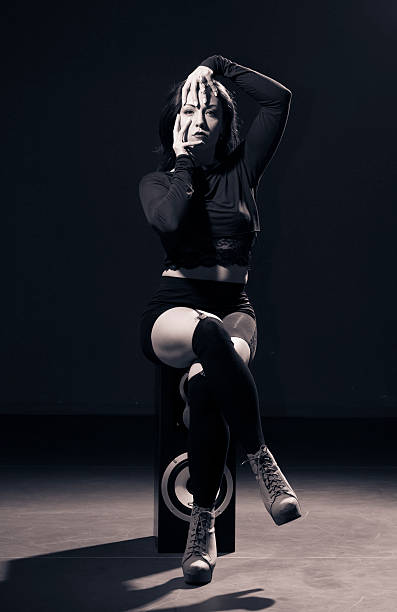 istock One girl posing in Vouge dance style. 507281612