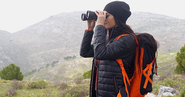 istock Happy smiling woman enjoying a misty hike 507282622