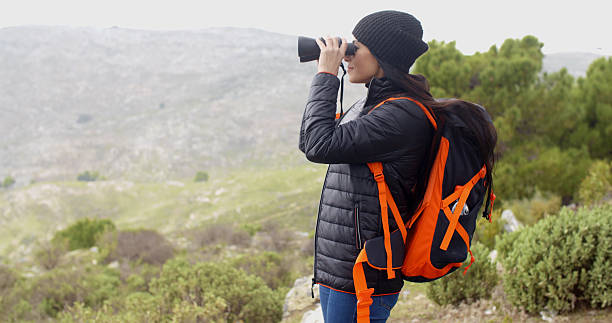 istock Young woman hiking on a misty day 507282640