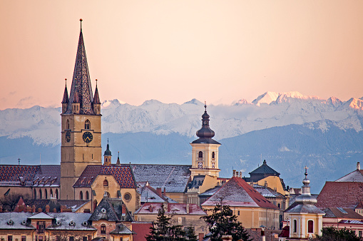 Sibiu, cityscape in winter with Carpathians in background