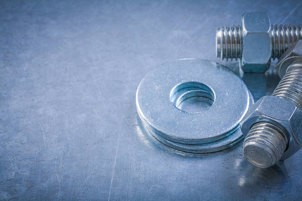 istock Stainless bolt washers screwbolts construction nuts on metallic 507294068