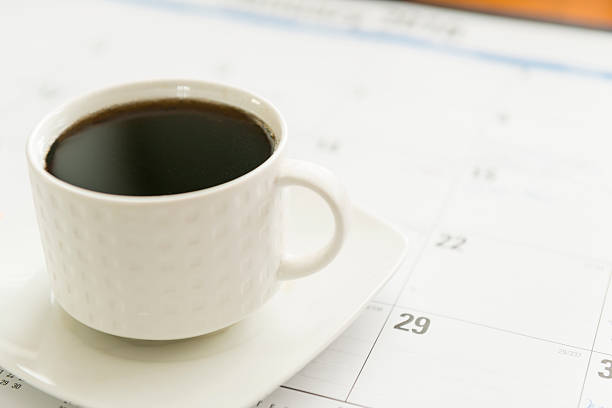 istock Calendar and cup of coffee. 507294468